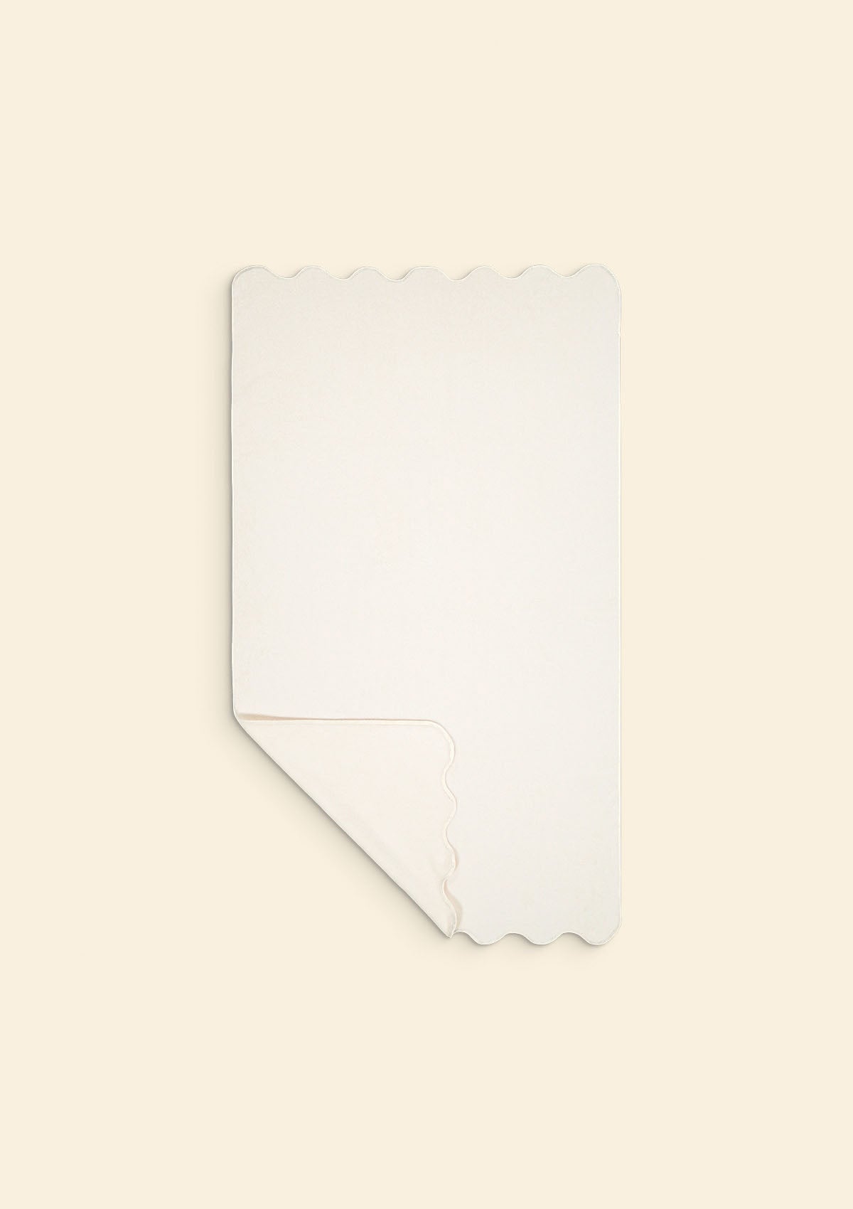 Le drap de bain ondulé en coton ivoire