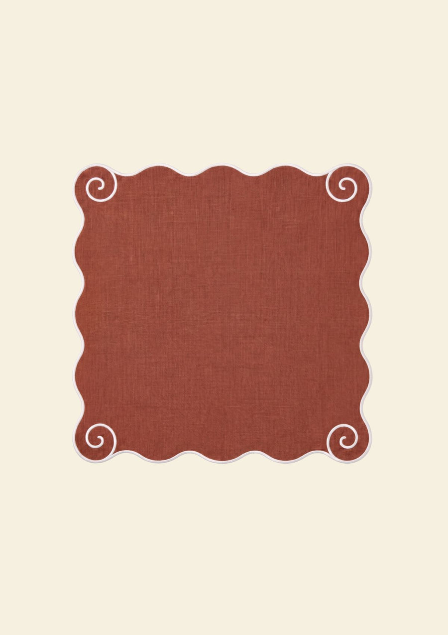 La serviette de table Volute en lin Tomette & Blanc