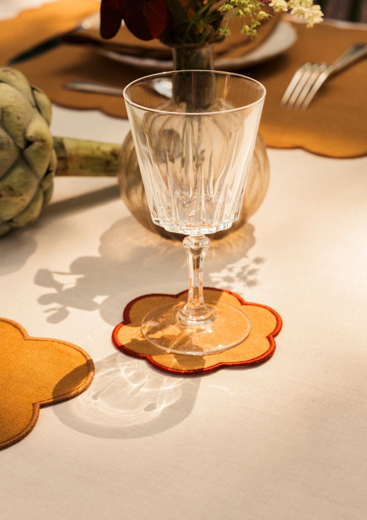 Yellow ocher and red ocher scalloped linen coasters (set of 4)