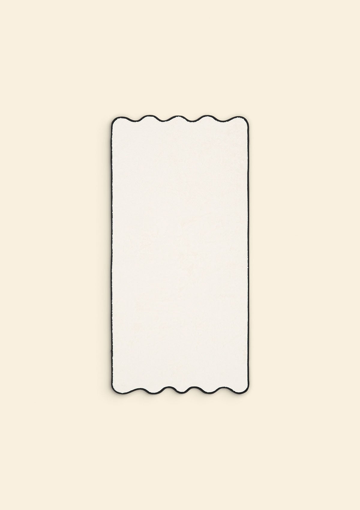 La serviette de toilette ondulée en coton ivoire & noir