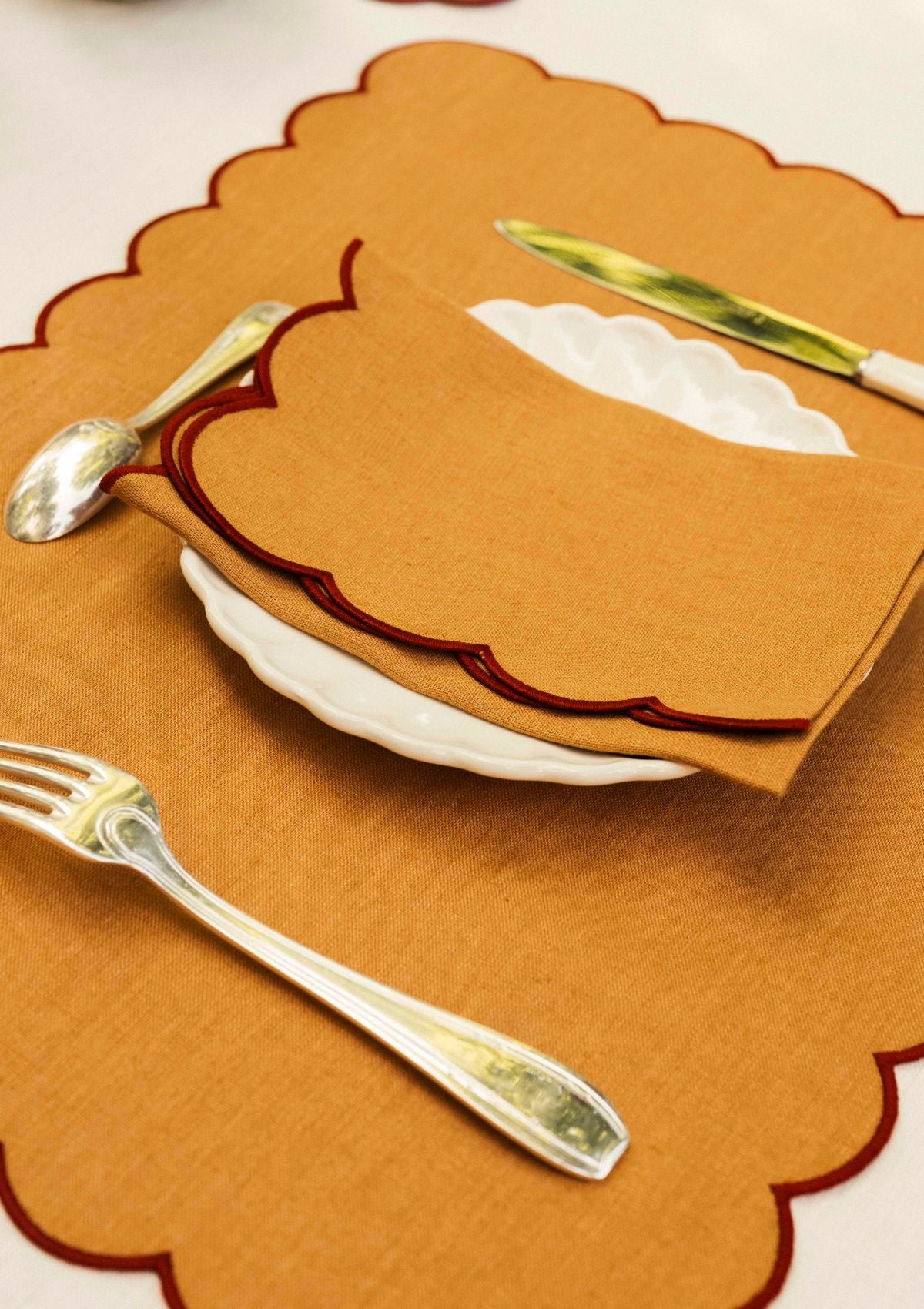 Yellow ocher & red ocher scalloped linen napkins (set of 2)