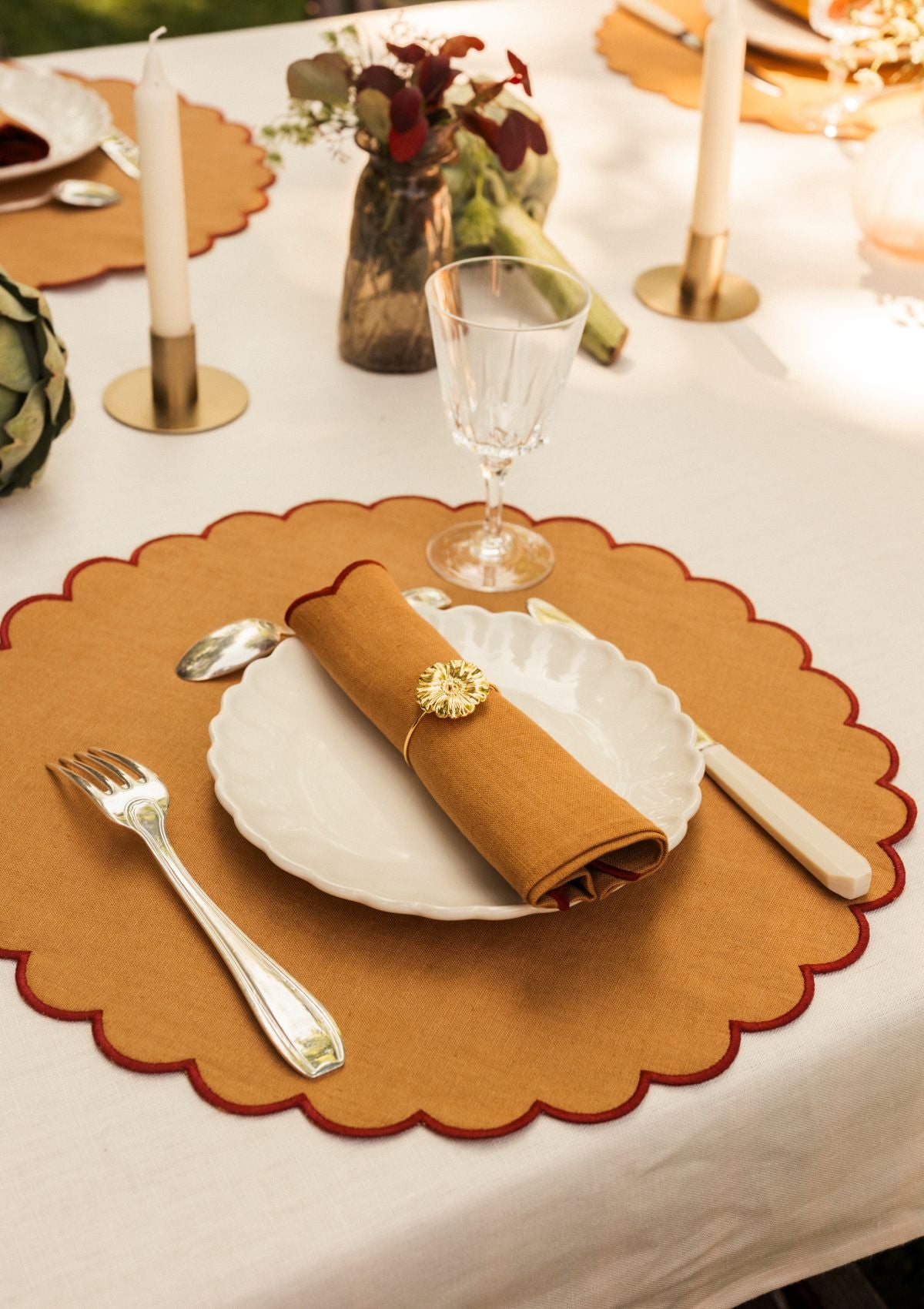 Yellow ocher & red ocher scalloped round linen placemats (set of 2)