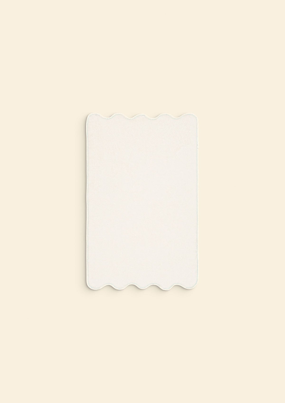 The ivory cotton wavy bath mat