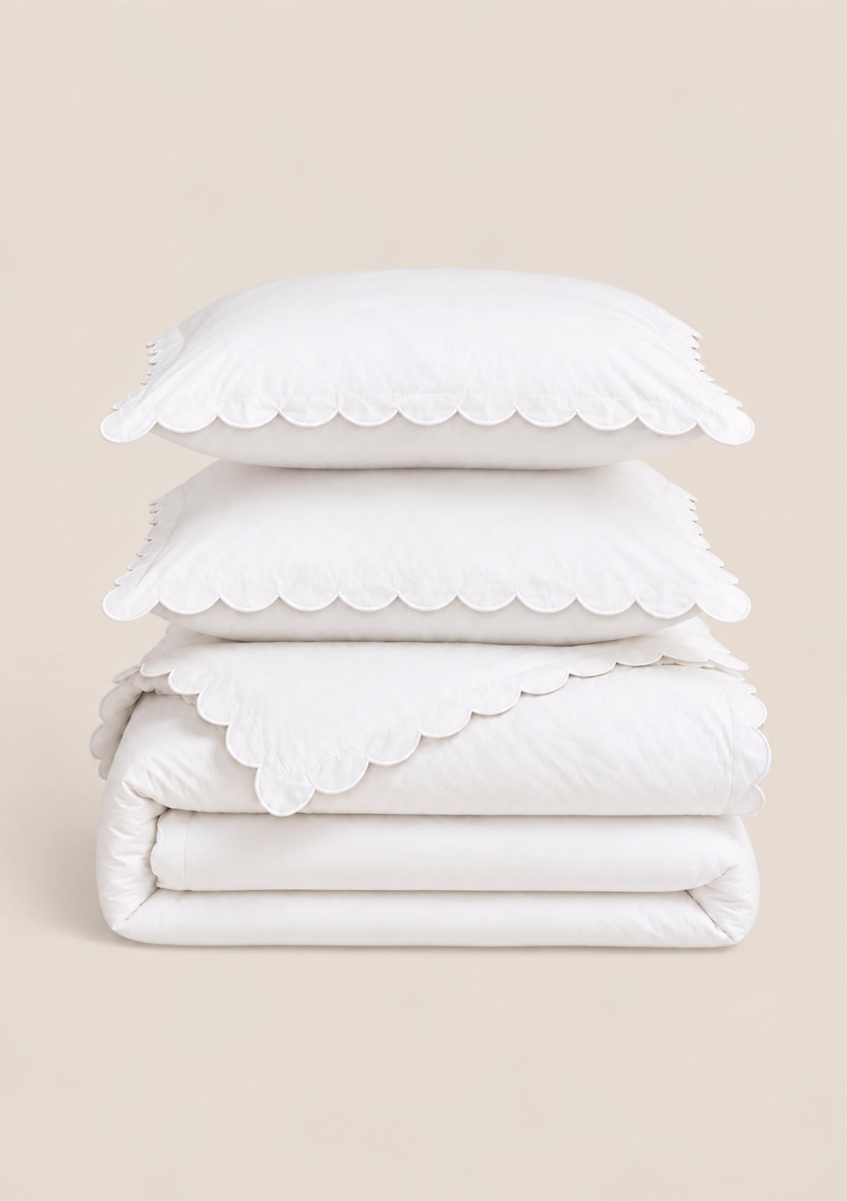 La parure de lit festonnée en percale de coton blanc