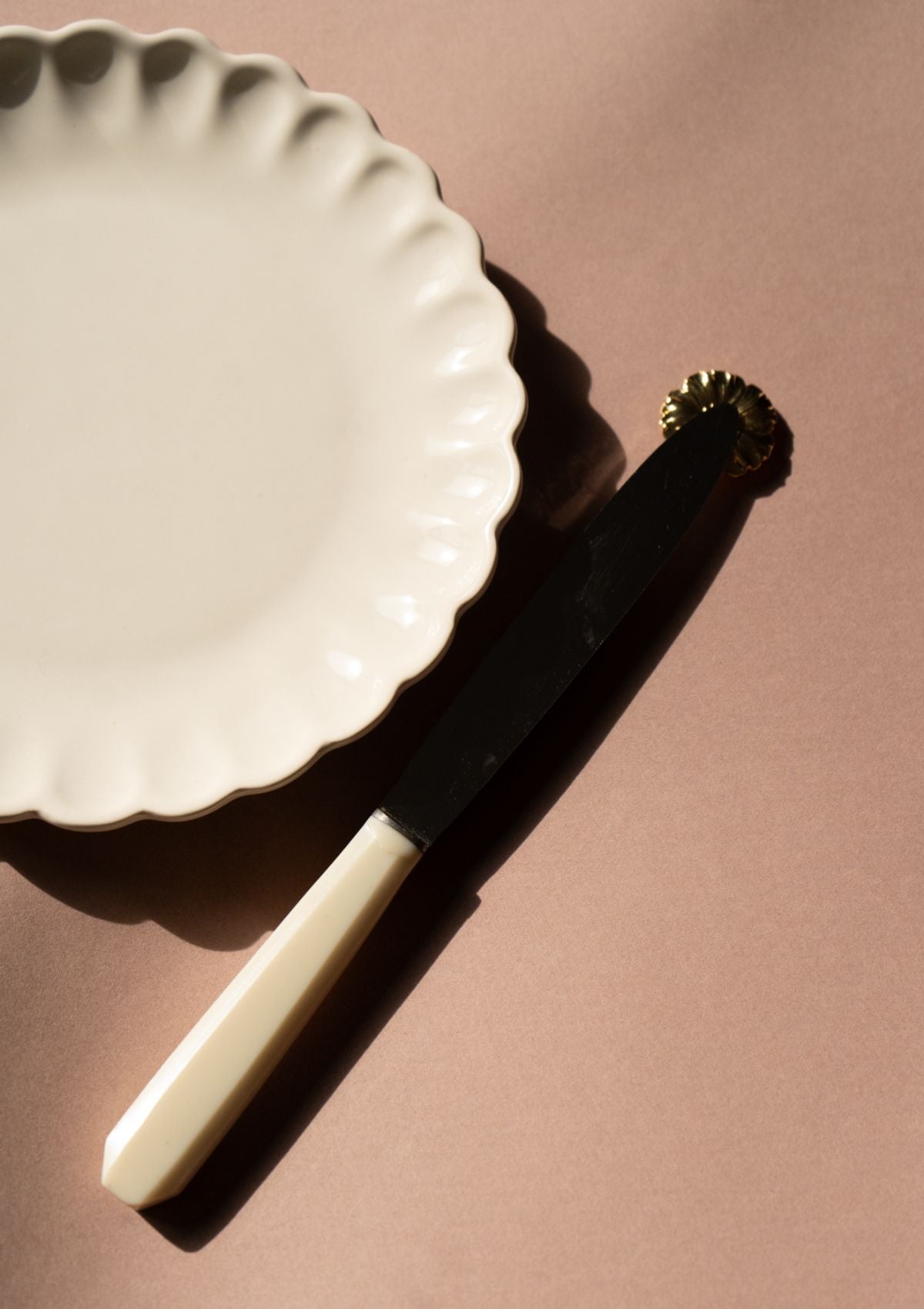 The Bouton d'or gold jewelry knife holder