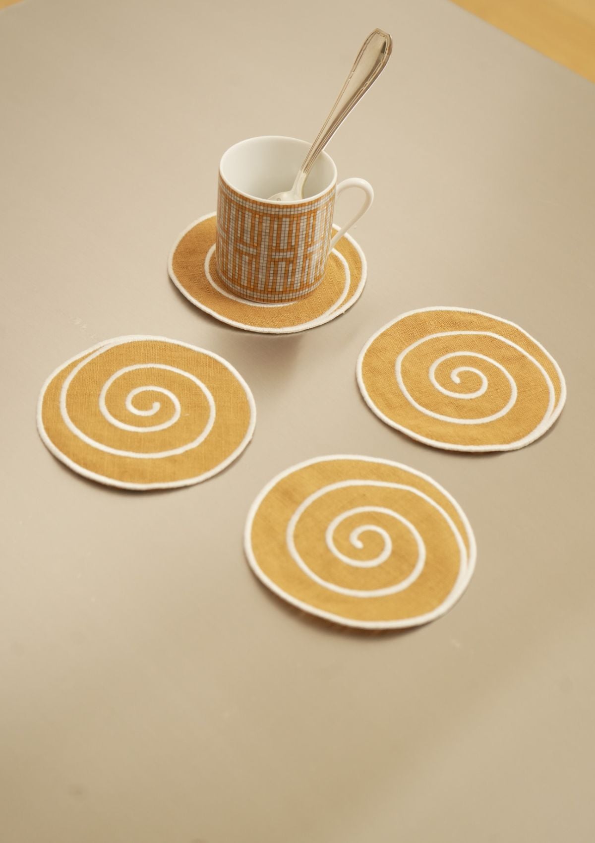 Volute linen coasters in Ocher Yellow & White (set of 4)