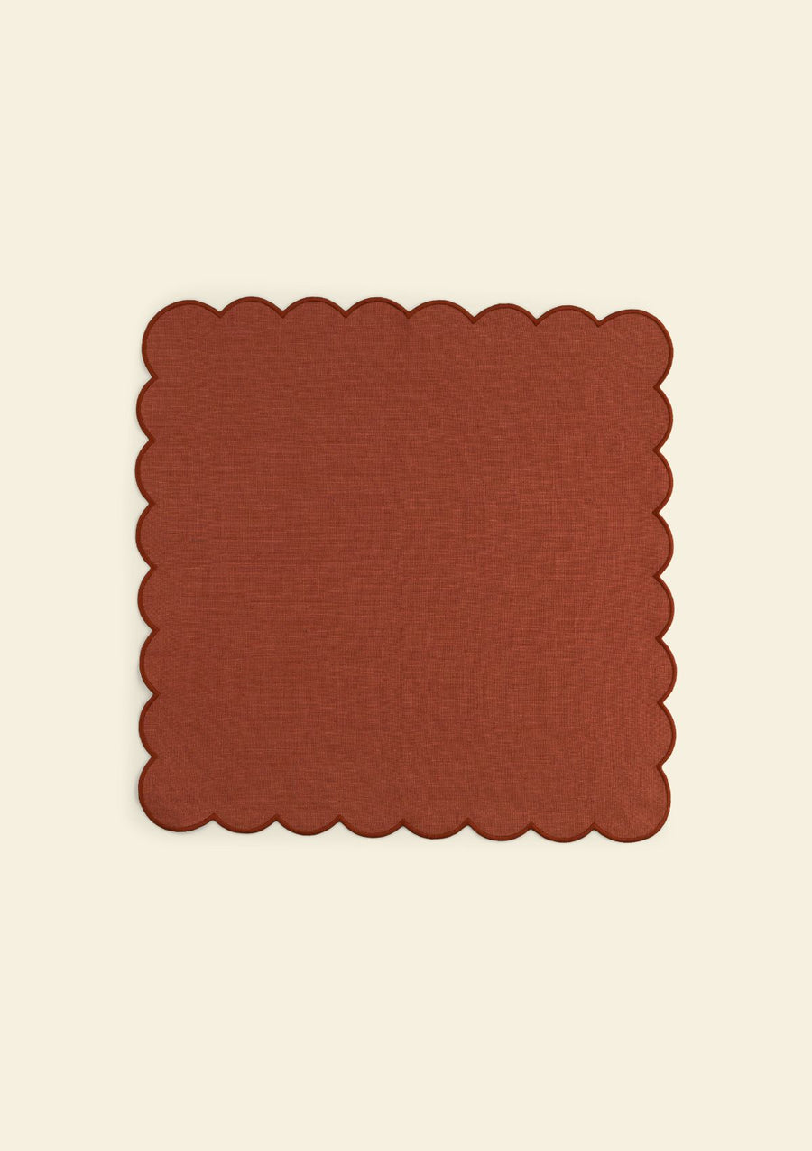 Red ocher scalloped linen napkin