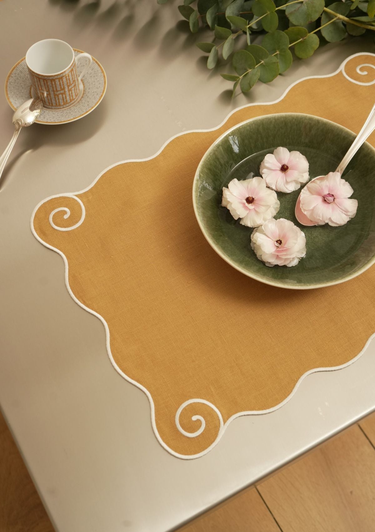 The Volute Placemat in Ochre Yellow & White Linen