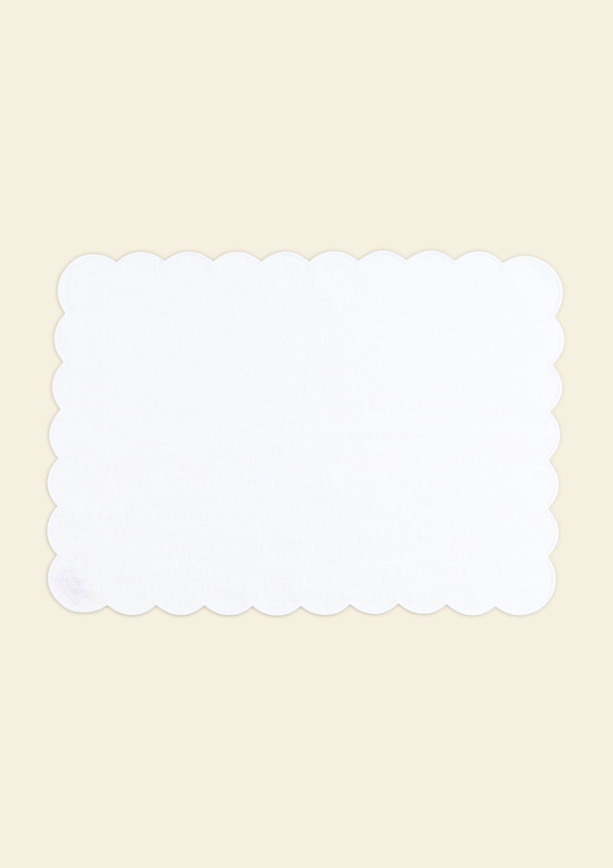 White rectangular scalloped linen placemat