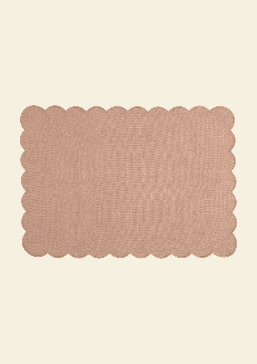 Powder pink scalloped rectangular linen placemat