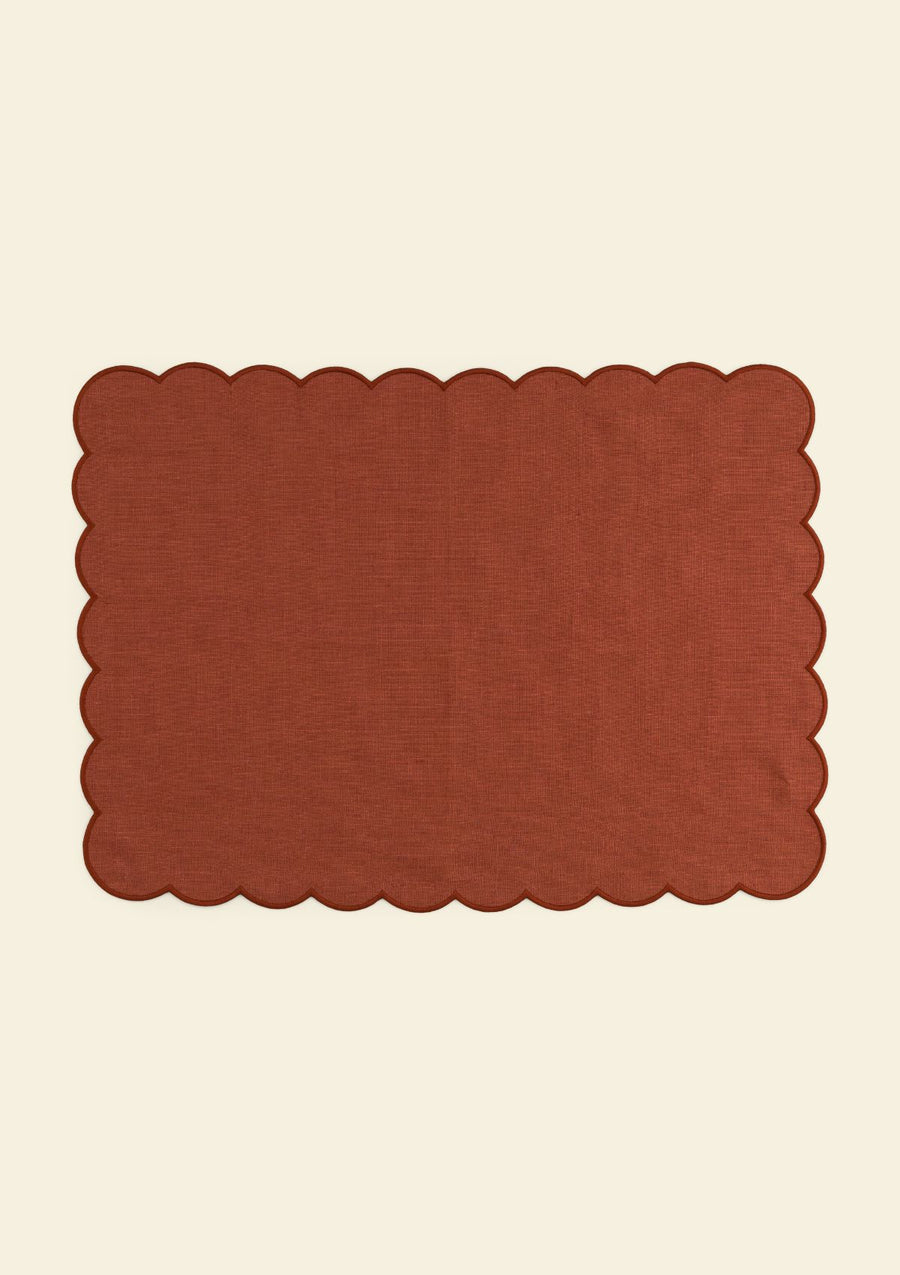 Red ocher scalloped rectangular linen placemat