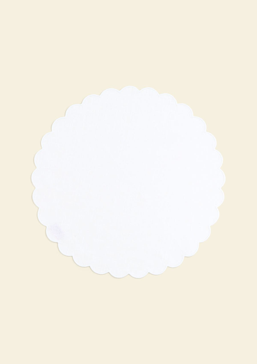 White scalloped round linen placemat