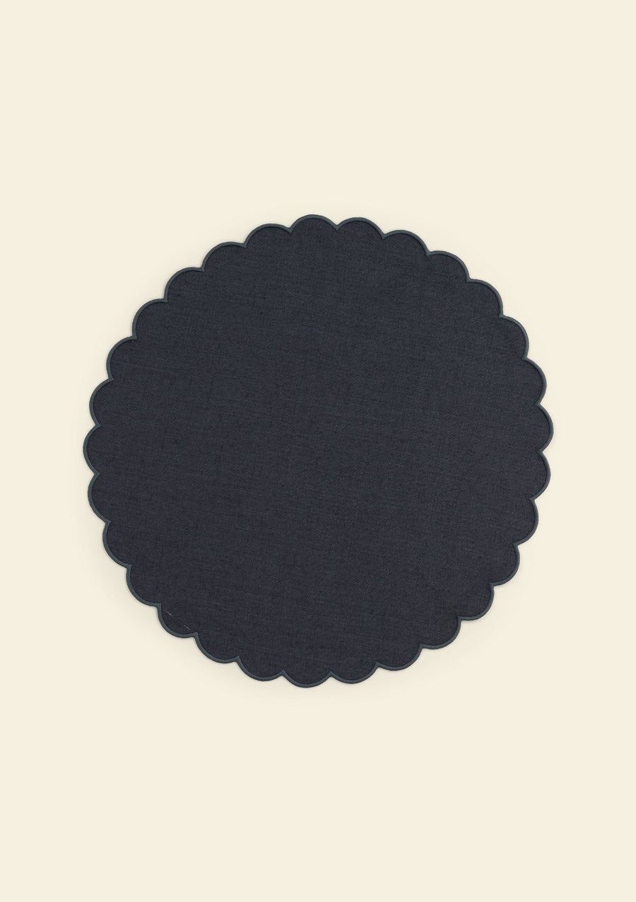 Slate blue scalloped round linen placemat