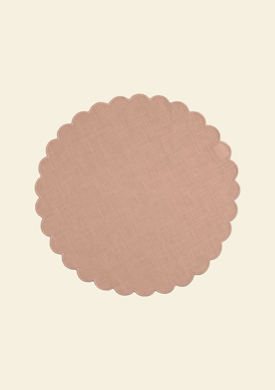 Powder pink scalloped round linen placemat