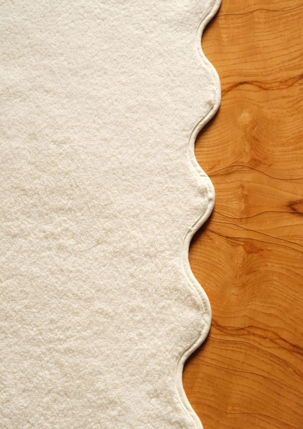 La serviette de bain ondulée en coton ivoire