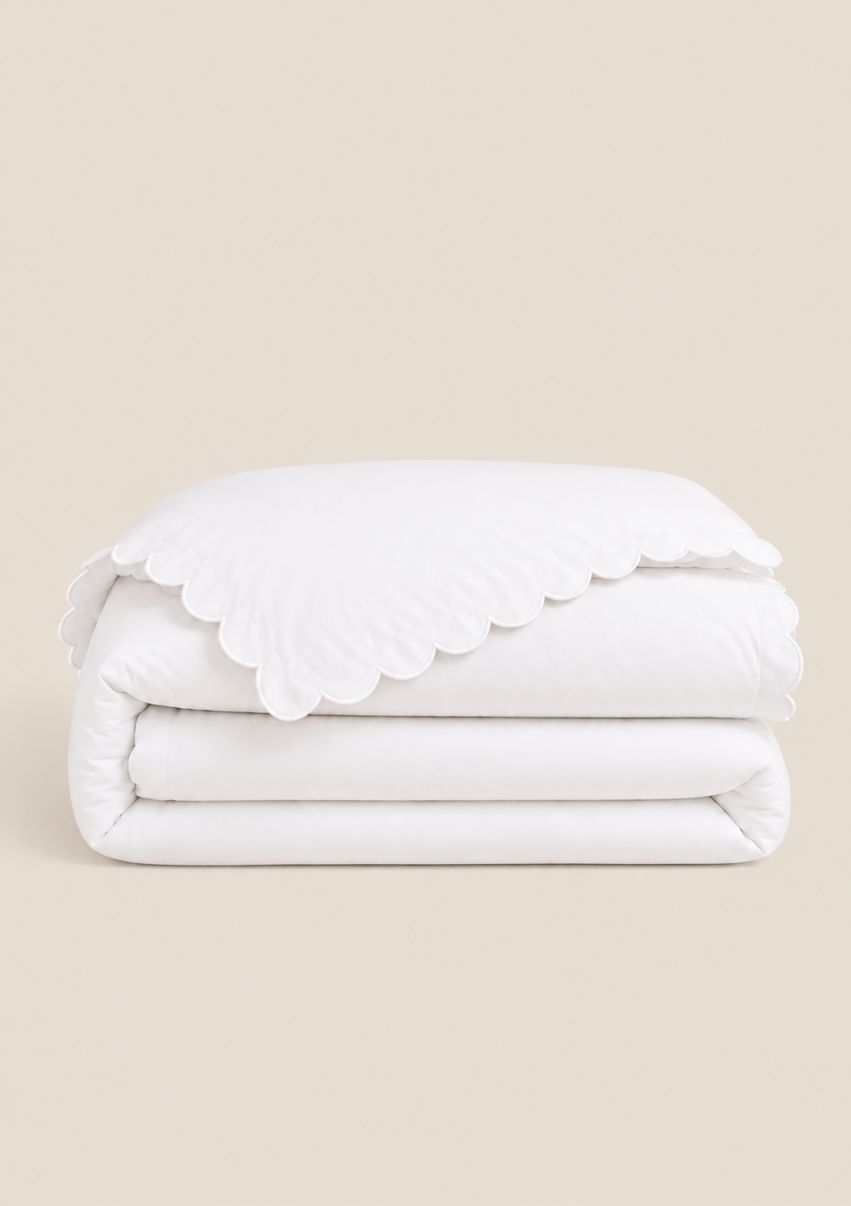 La housse de couette festonnée en percale de coton blanc