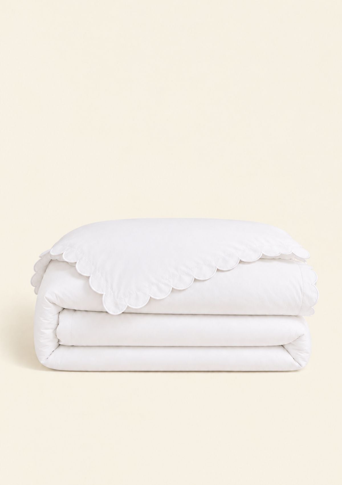 La housse de couette festonnée en percale de coton blanc