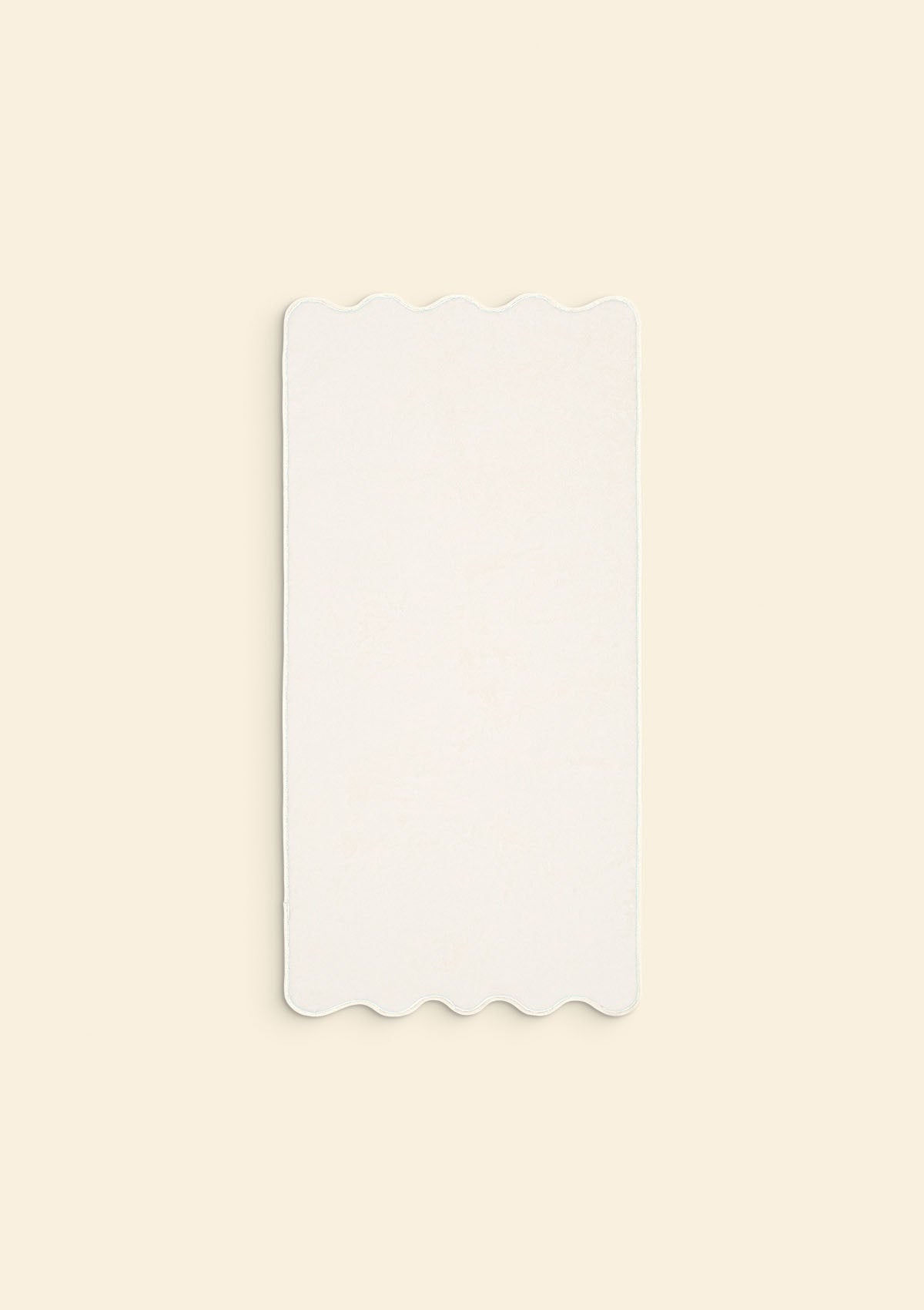 La serviette de toilette ondulée en coton ivoire