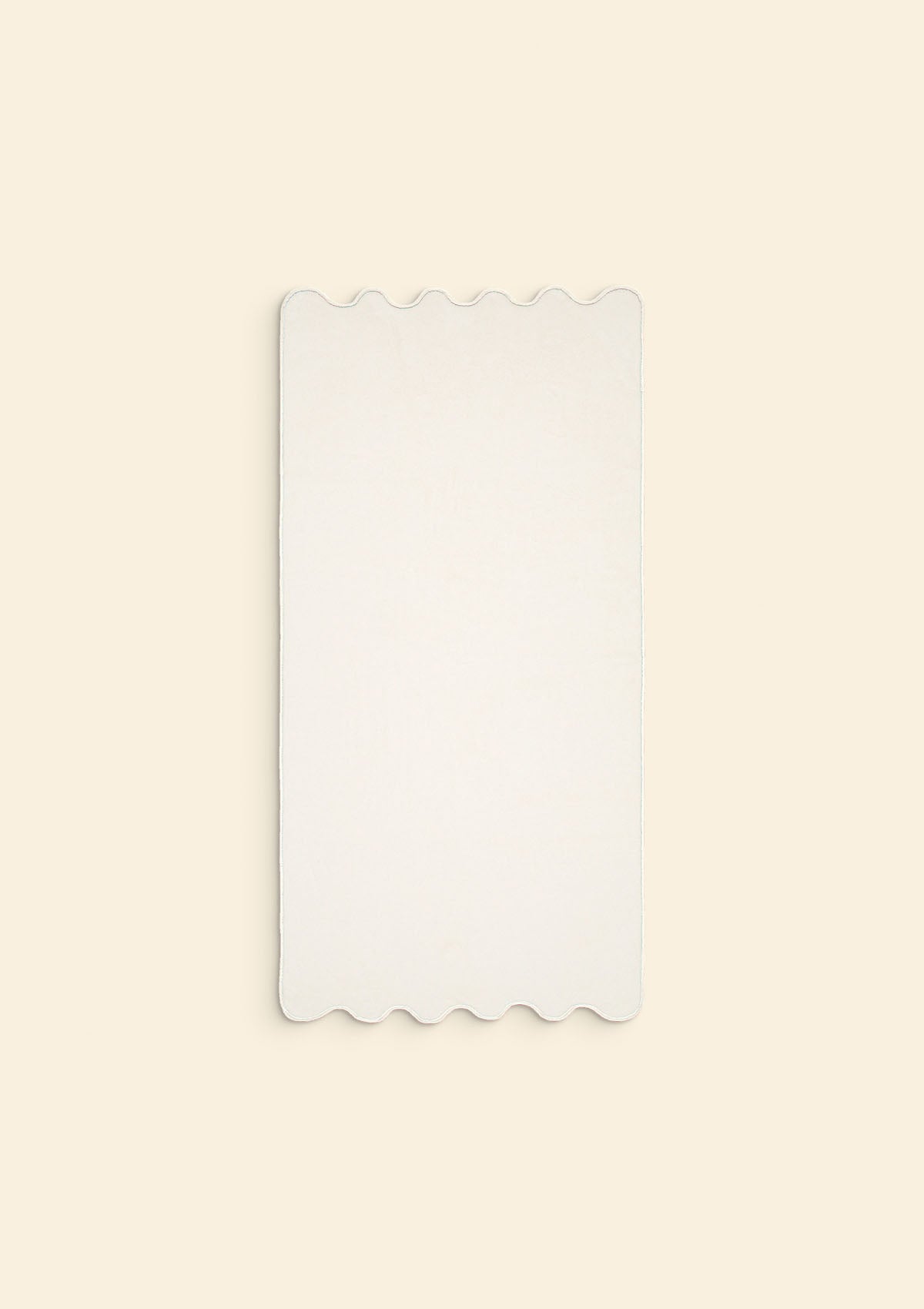 La serviette de bain ondulée en coton ivoire