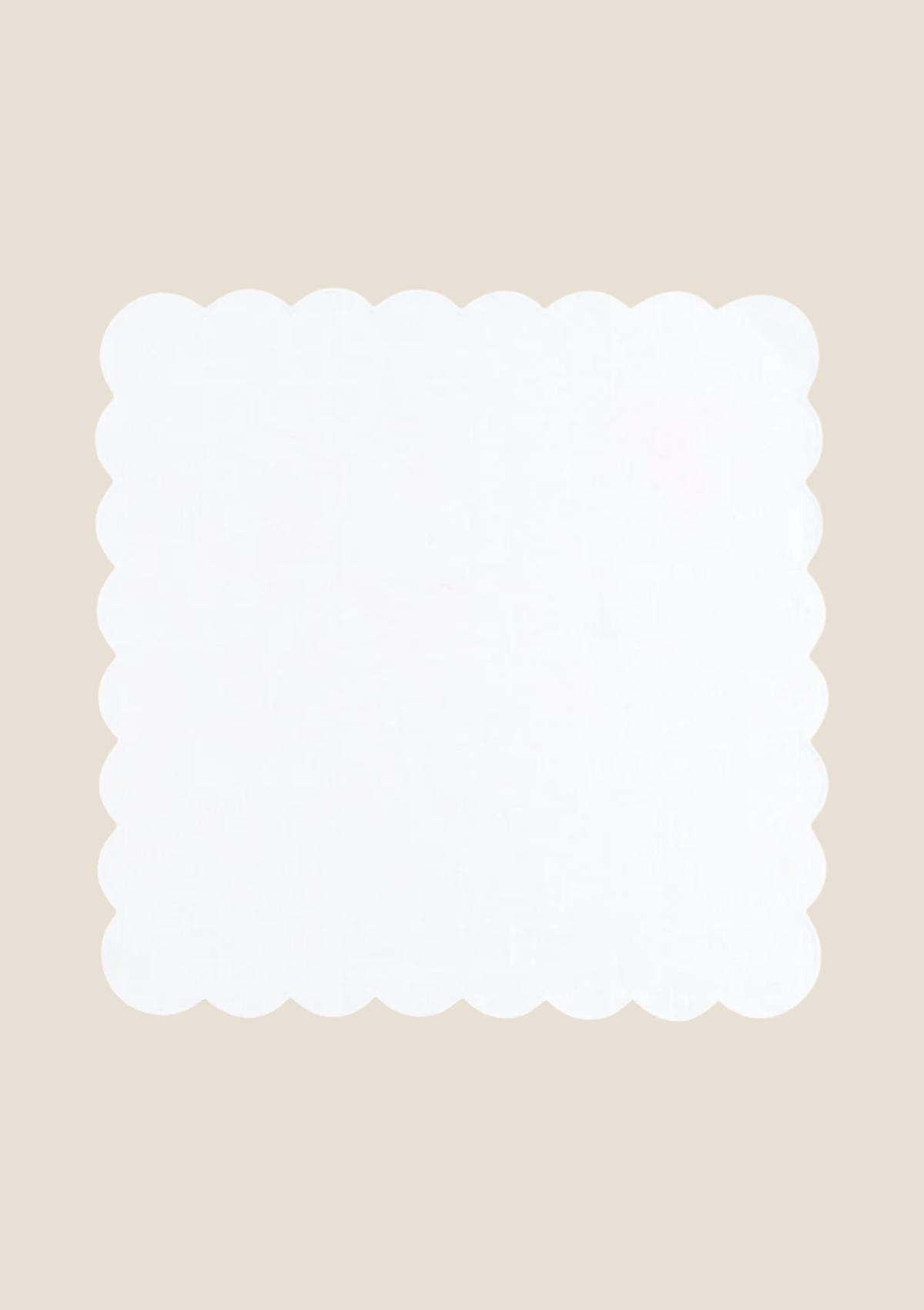 Scalloped white linen napkin