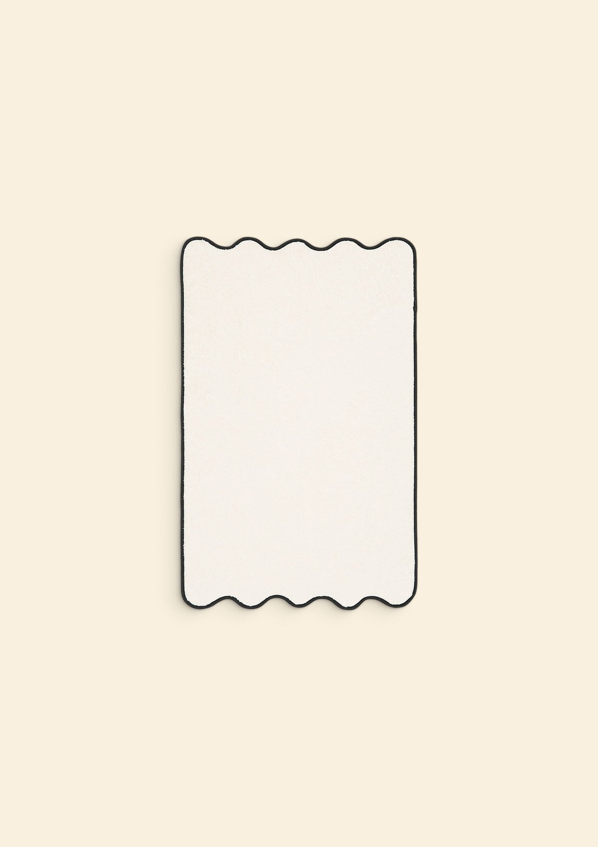 The ivory &amp; black cotton wavy bath mat