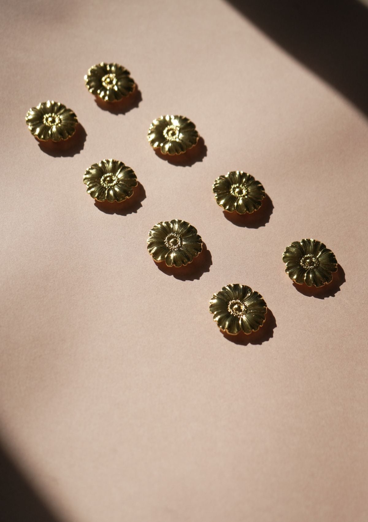 Le porte-couteau bijoux or Bouton d'or