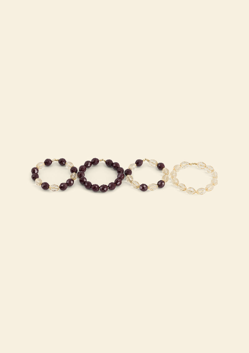 L'ensemble de 4 ronds de serviette bijoux Rubis & Jonquille